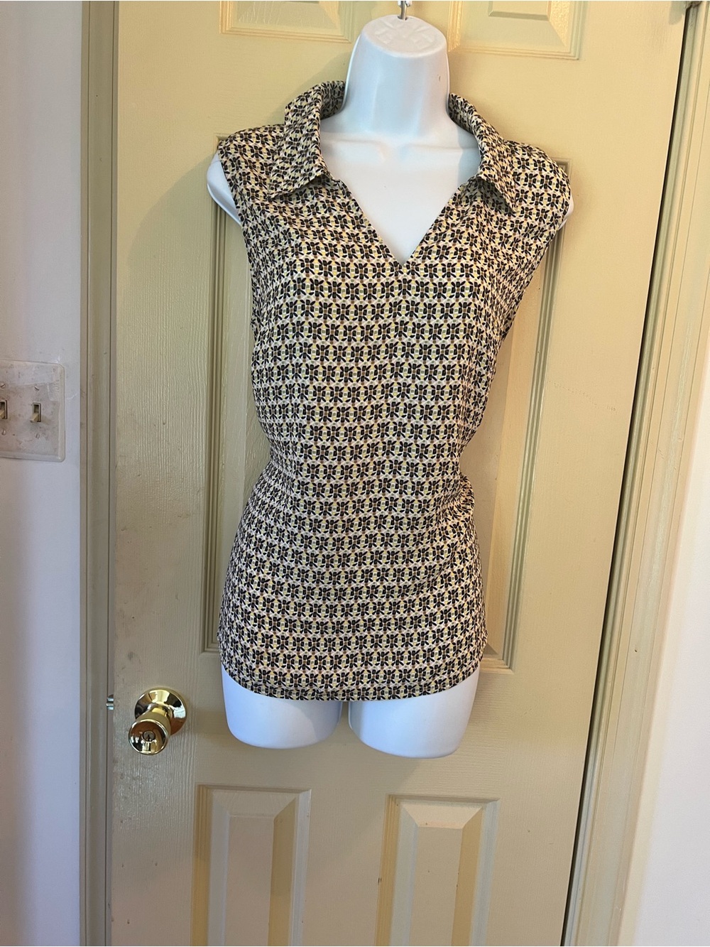 CAbi Sleeveless Collared Knit Tank in Black and Cream Geometric